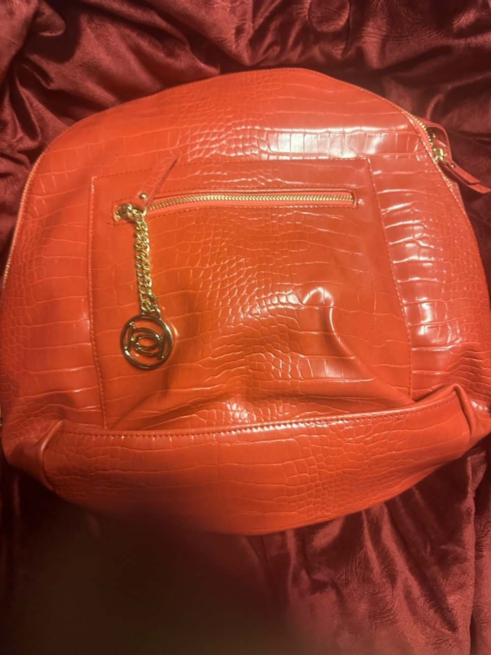 bebe Orange Faux-Croc‎ Backpack with Gold Chain Charm